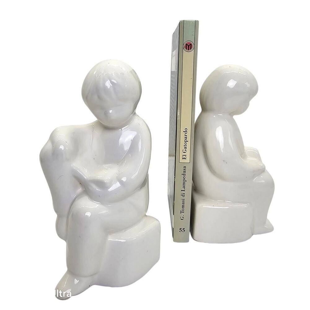 Vintage White Porcelain Bookends of Boy and Girl Reading From The Netherlands